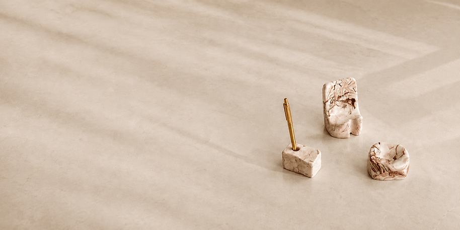 Luxury sculptural desk accessories by Guseli Design – handmade designer phone stand, pen holder and sculptural paperweight
