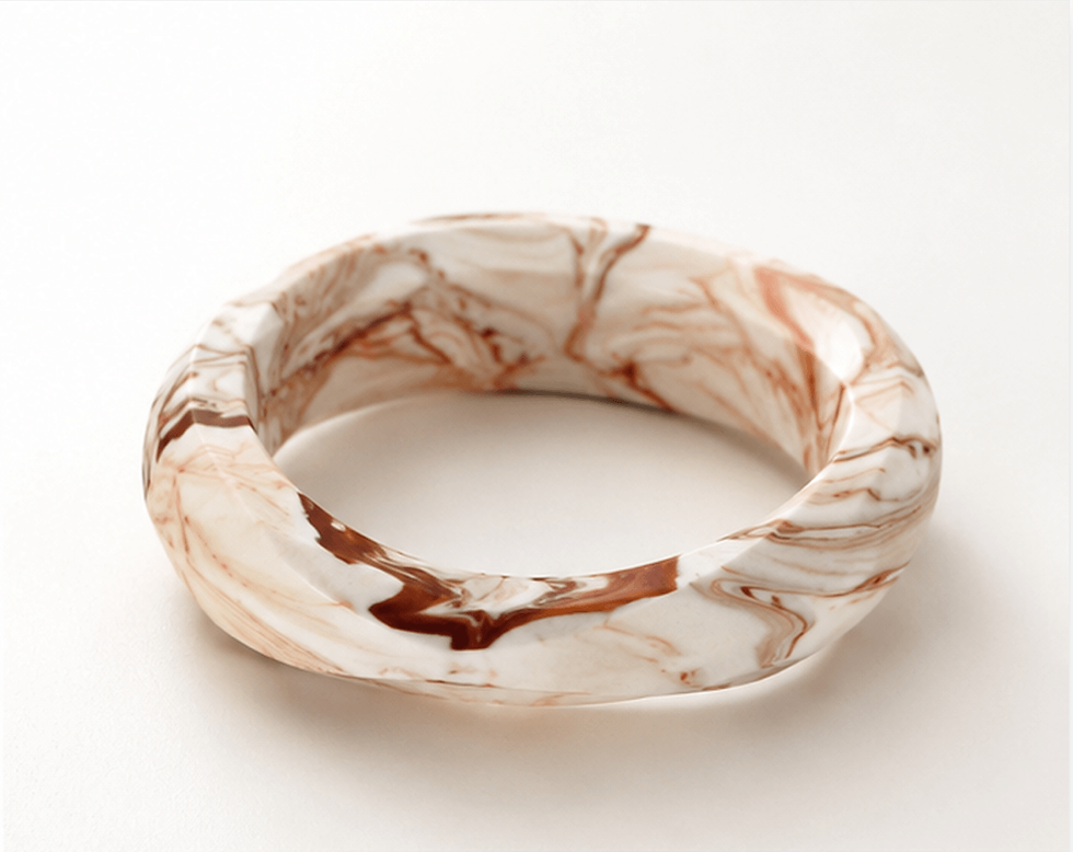 Contemporary sculptural statement bangle in Umber Vein marbled mineral composite handcrafted in Australia by Guseli Design