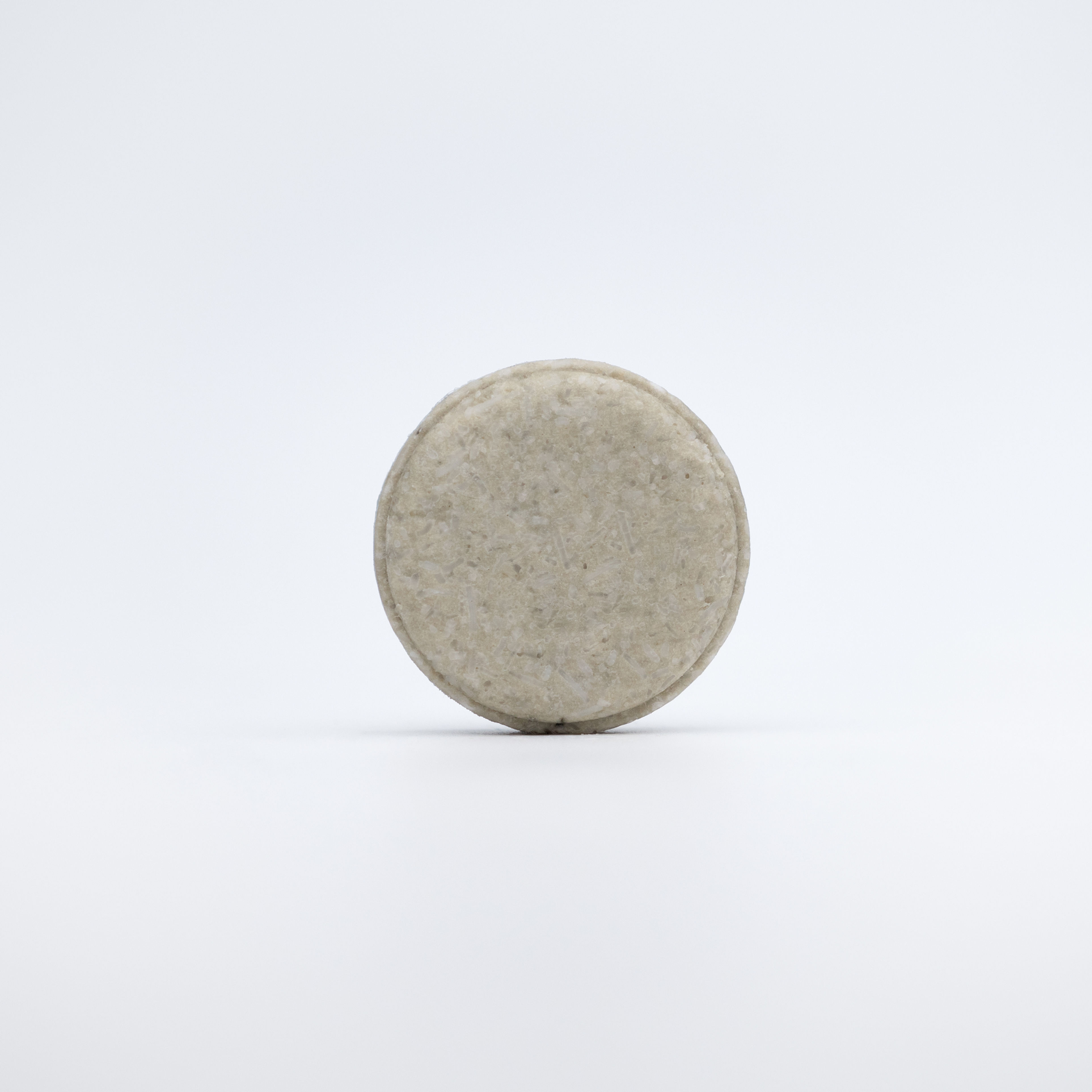 Botanical Skincare Lab's Classic Terra Shaving Puck is a round solid bar made from sustainable vegan ingredients in Australia