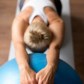 senior-woman-with-short-hair-doing-stretching-exercises.jpg