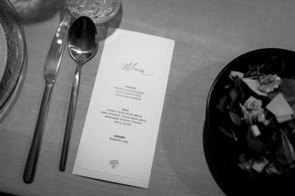close up of the menu, cutlery and dish