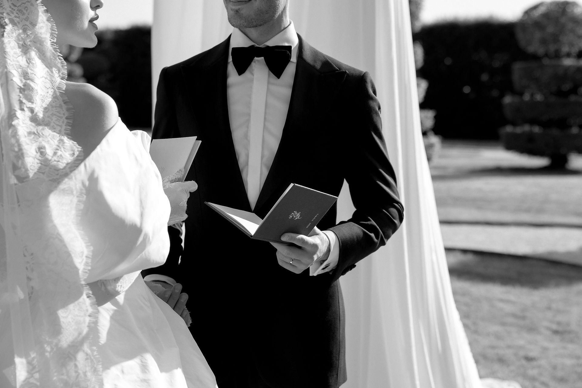 Close up in black and white, Bride and groom exchanging vowswedding in villa arconati, milan, italy
