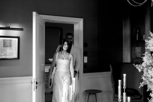 Fiancee enters the room surprised, cigar room in Villa Honegg, Switzerlandblack and white picture, 