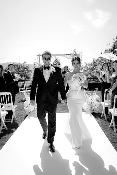 Ceremony exit of a destination wedding from an an american couple at the Dolder grand hotel, luxury hotel in Zurich, Switzerland. Destination wedding and elopement photographer in Switzerland