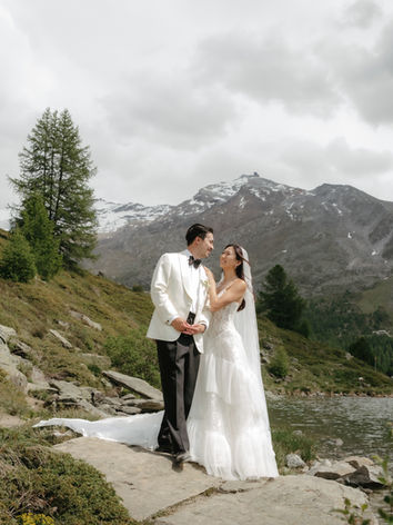 bride and groom posing from destination wedding at Cervo Zermatt. Wedding photographer in Switzerland. Couple photoshoot in Sunegga, Zermatt, Switzerland.