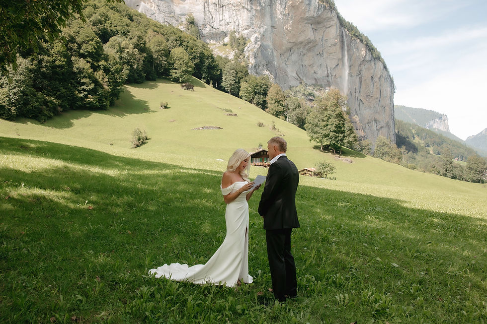 couple posing at staircase at hotel victoria jungfrau in Interlaken. An American elopement at Hotel Victoria-Jungfrau, Interlaken — vows in Lauterbrunnen, portraits at Blausee. A fine art Swiss wedding story. Vows exchange in Lauterbrunnen in front of the waterfall.