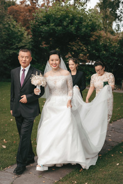 Bride's entrance with her dad and friends at the garden from Baur au lac Zurich 