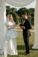 Bride and groom exchanging vowswedding in villa arconati, milan, italy