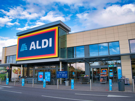 Solar control window film on UK supermarket storefront