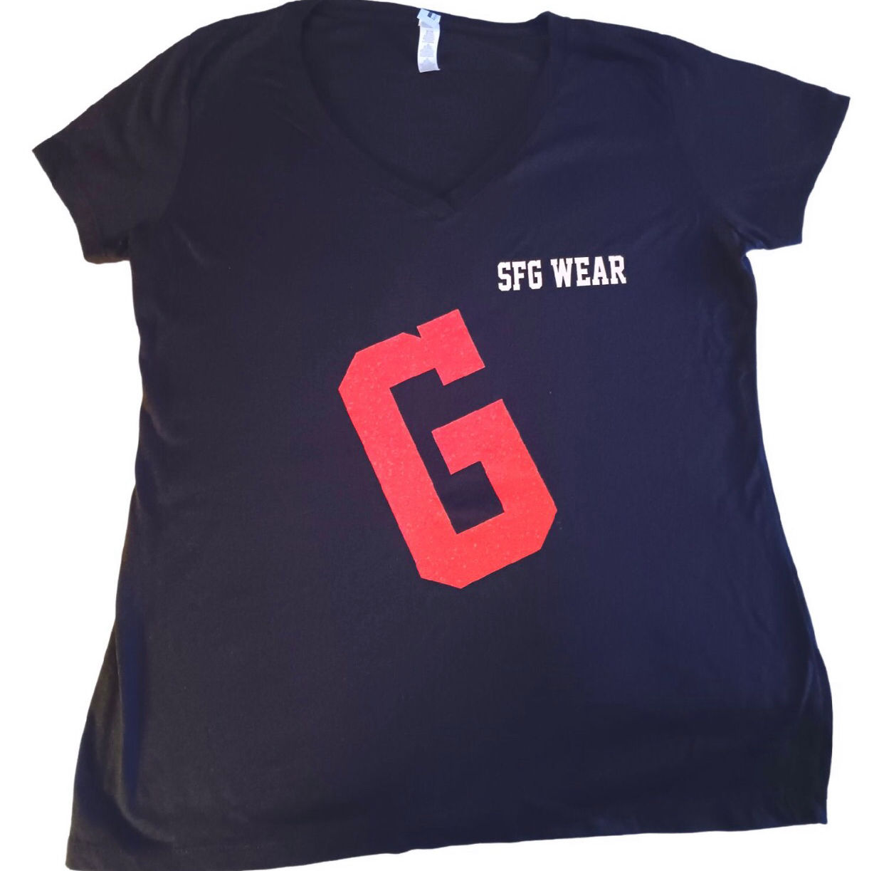 SFG WEAR…Black V-neck “G” short sleeve T-shirt. Click to view image 459