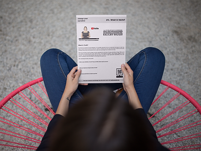 mockup-of-a-girl-holding-a-catalog-while-crossing-her-legs-a14650.png