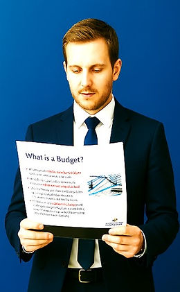 AQA A Level Business landing page hero image - male teacher reading a printout of a lesson resource