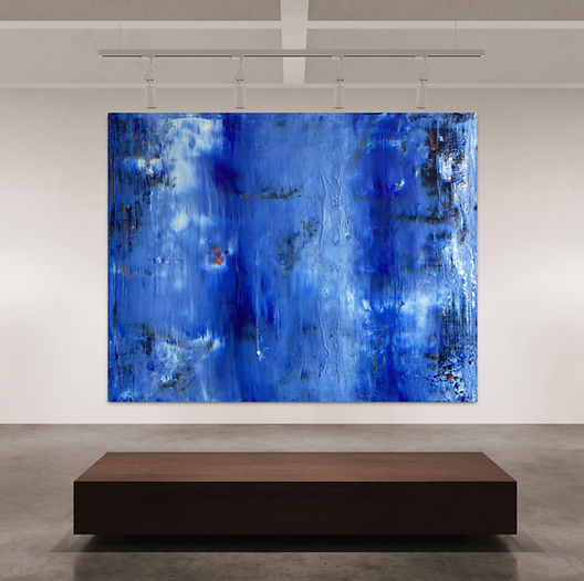 "An abstract artwork by Katja Marinic in shades of blue, beautifully displayed in a gallery setting."