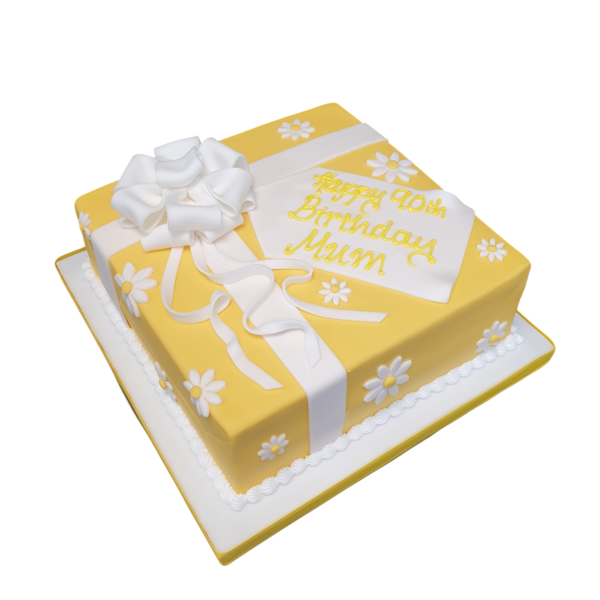A beautifully crafted 8" parcel-shaped cake, perfect for celebrations and special occasions. Ideal for surprising someone special with a unique and elegant treat.