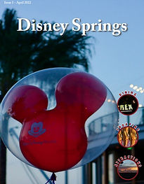 Mickey mouse shaped red balloon at downtown disney with palm trees in the background