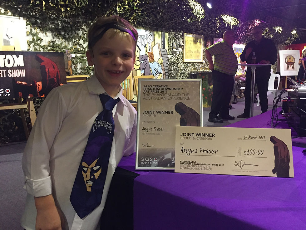 Angus Fraser proudly shows off his prizes