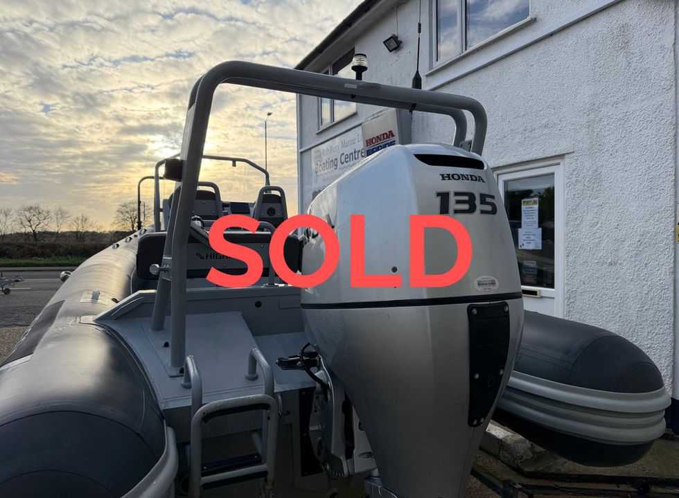 Highfield rib OM590 pictured outside Rob Perry Marine with a Honda BF135