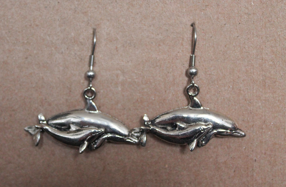 Miniatura: Delfin con cría