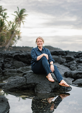 Life coach and shamanic practitioner Jill Schuler sitting by the water