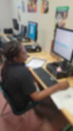 Student working on computer in classroom