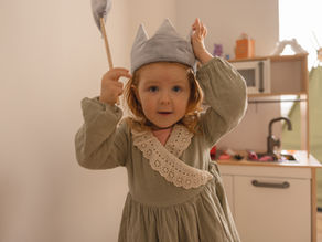 Why Imaginative Play is Important for Young Children - little girl dressed up as a princess with a magic wand