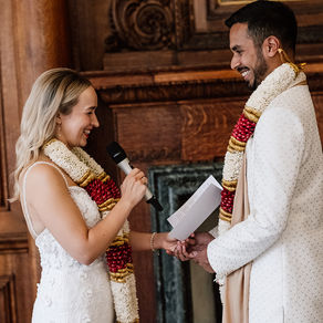 A couple shares their inclusive wedding vows in a fusion wedding