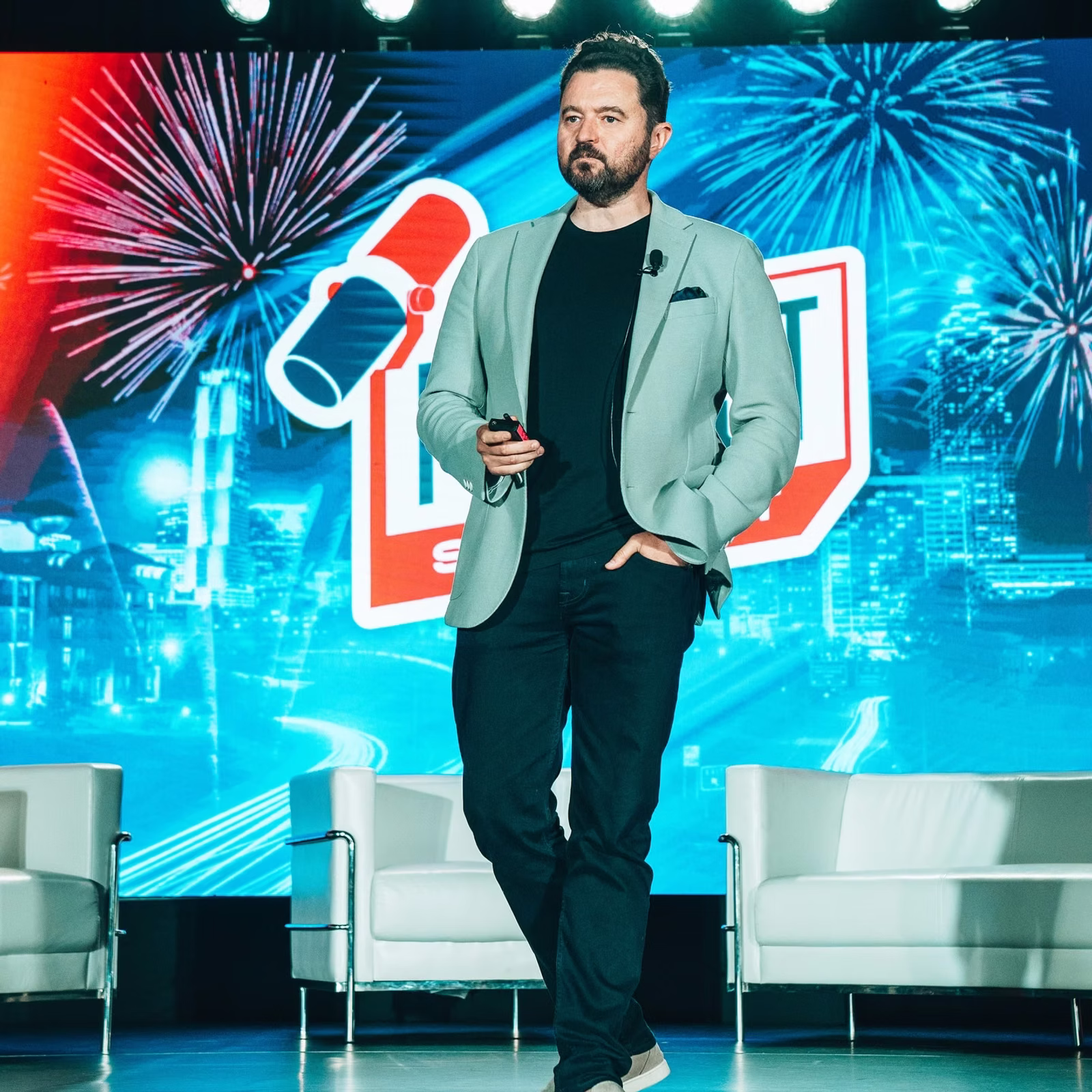 The Podcast Summit — speaker on stage.