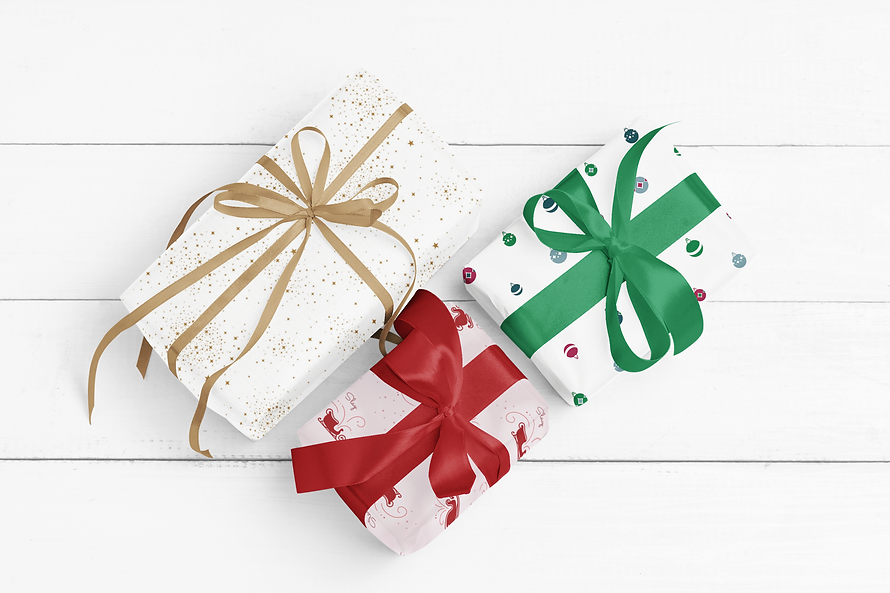 sublimated-wrapping-paper-mockup-featuring-three-gifts-lying-on-a-white-wooden-surface-m35