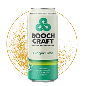 Booch Craft Ginger Lime hard kombucha can on white background, with an orange dotted circle behind it and teal-green label.