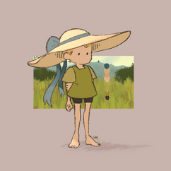 Young girl wearing green dress and large gardening hat