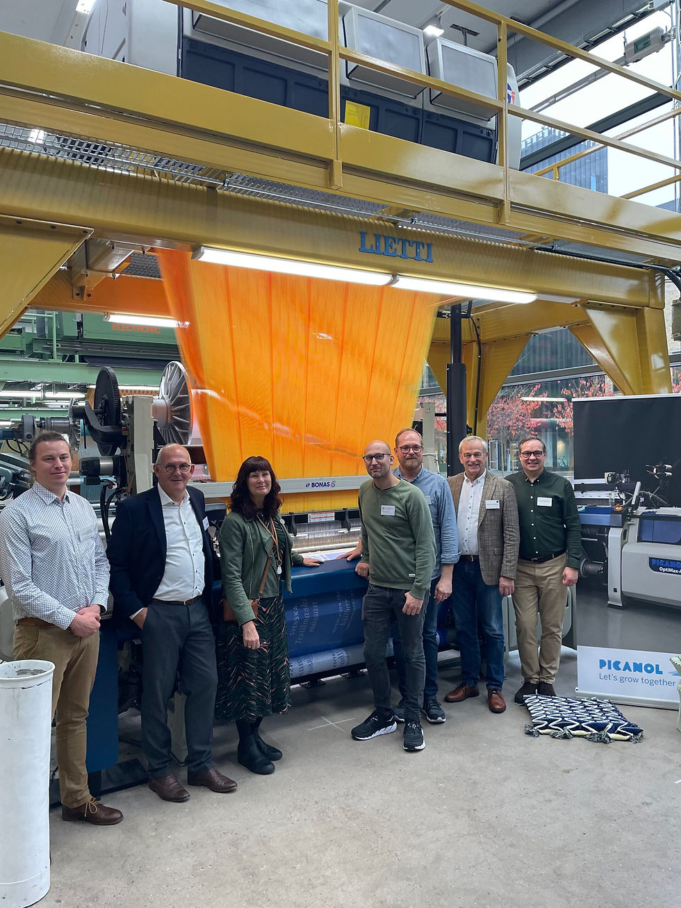 Ilmakunnas-Engblom team with Picanol textile machine