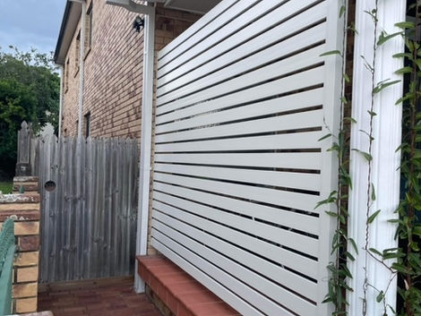 A slat privacy screen for patio