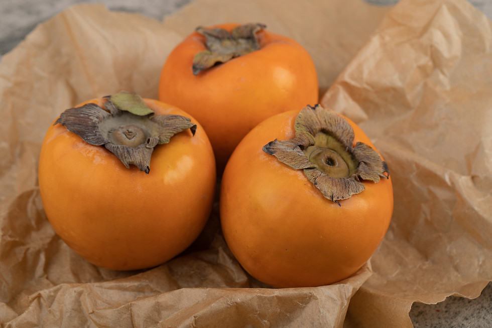delicious-ripe-fuyu-fruits-placed-paper-sheet.jpg
