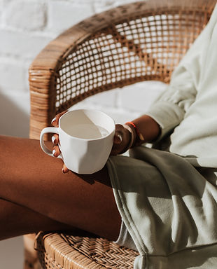 Someone holding a tea cup - Wellness and Holistic Blog