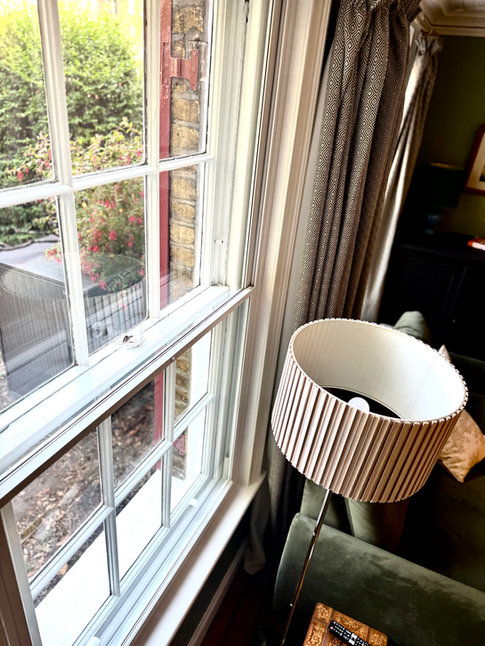 Secondary glazing fitted to conserve original windows in a heritage property