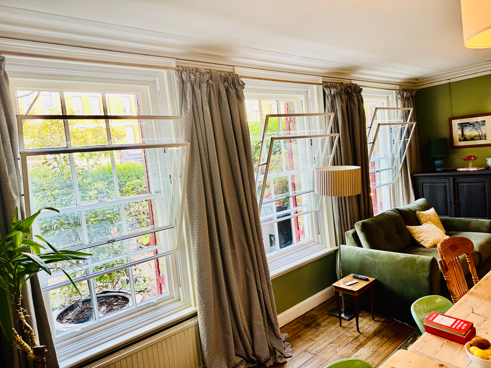 Secondary glazing installed on old wooden frames to improve thermal efficiency