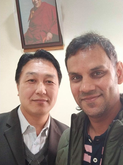 Dr ABhishek Pasari in conversation with Education Minister at Dharamshala