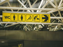 Here’s What These Common—But Confusing!—Airport Signs and Symbols Mean