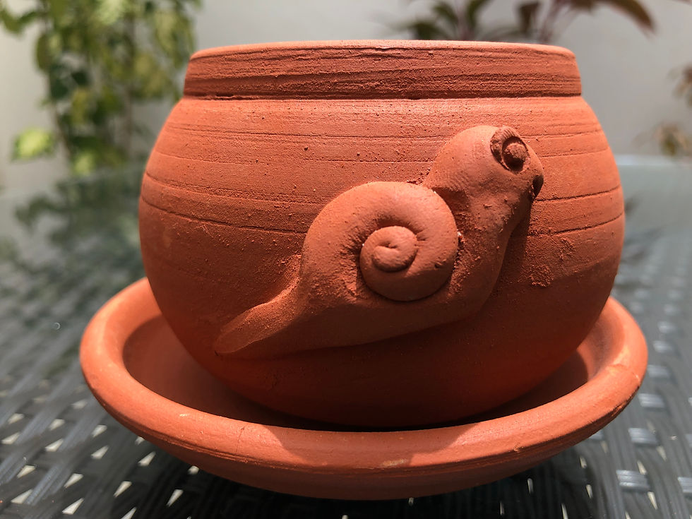 Thumbnail: Round shape Terracotta planter Snail