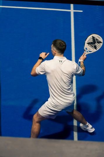 Padel player preparing to play during tournament