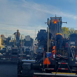 Machine pour construction de route
