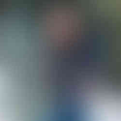 Adri and her infant son hike in the Canadian Rockies.