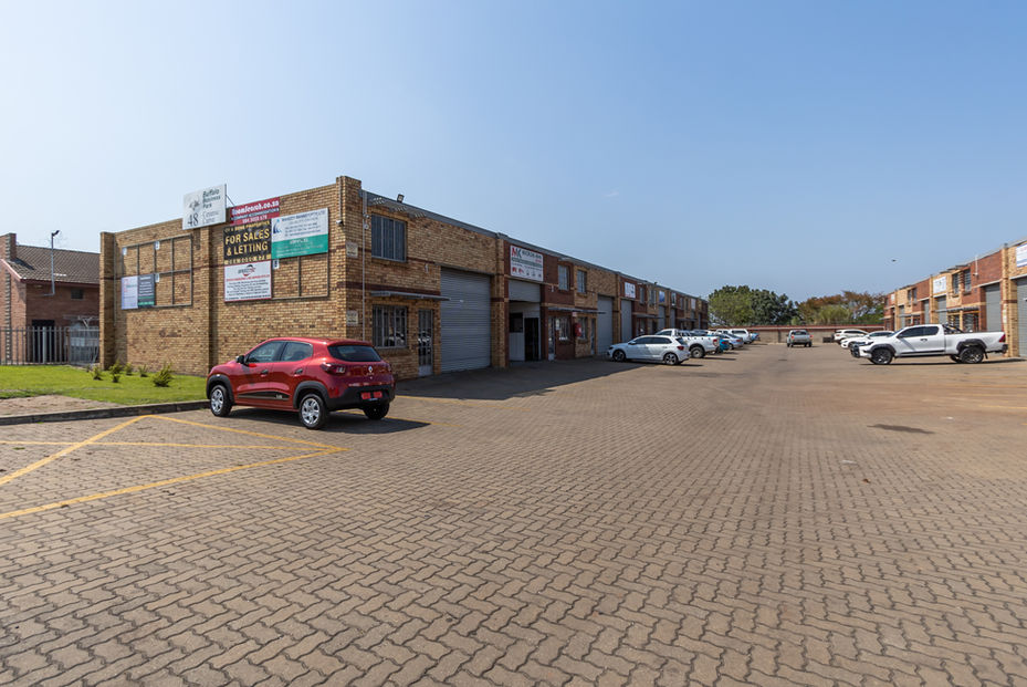 Exterior view of a large industrial warehouse in Richards Bay available for lease.