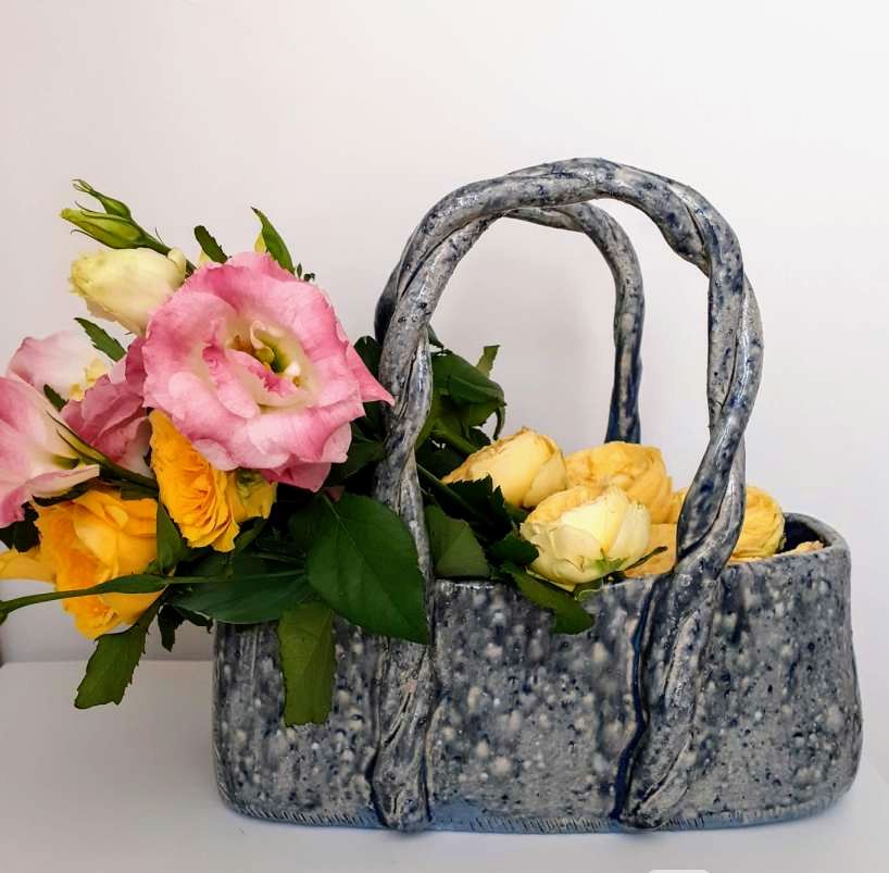 A purse shaped vase