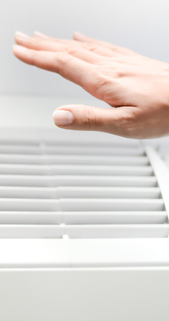 Hand Near Air Conditioner