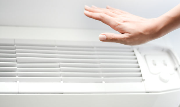 Close-up of HVAC vent blowing air in a newly installed system
