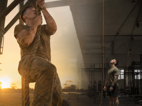 The same rope bridges two chapters of life—a young Marine fighting upward on an obstacle course and an older coach reflecting before dawn inside a strength gym.