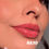 Miniatura: Gloss Labial Radiant Kiss -  Ruby Rose
