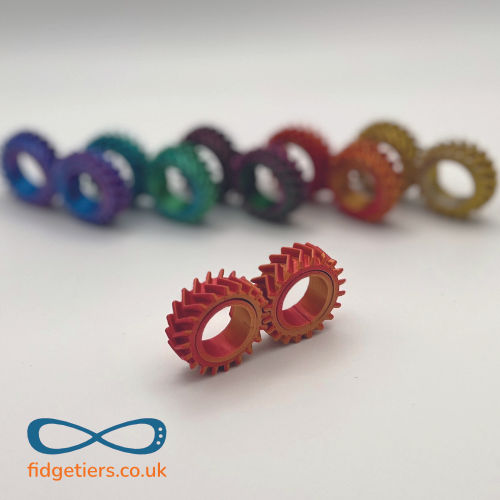 GearDuo finger fidet gears by Fidgetiers shown in Blue and Gold (Phoenix-Fire)