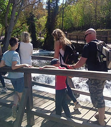 People cross the bridge